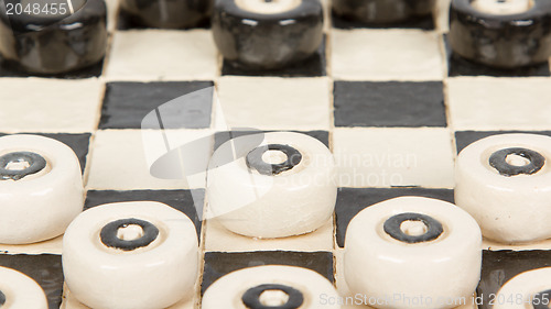 Image of Very old game of checkers, pottery