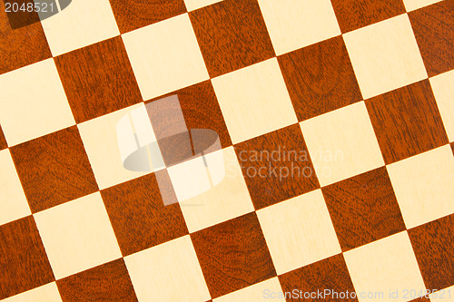 Image of Very old wooden chess board, isolated