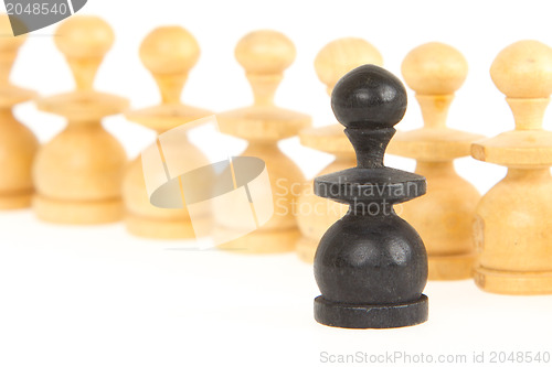 Image of Old handcarved chess pieces isolated