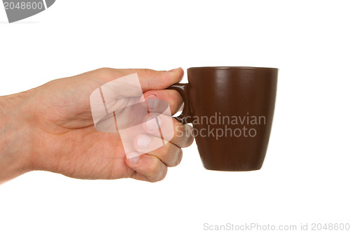 Image of Man holding a cup of coffee