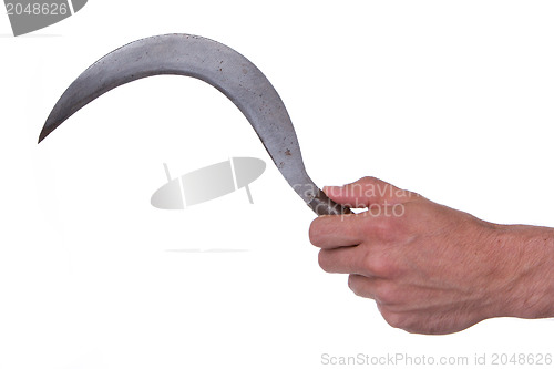 Image of Man holding a rusted sickle