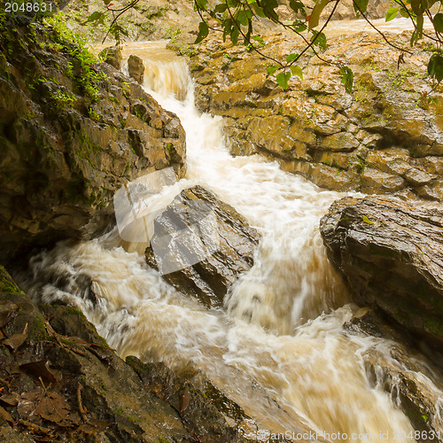 Image of Closeup of a dirty waterfall