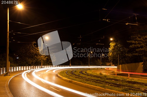 Image of Speeding cars at night