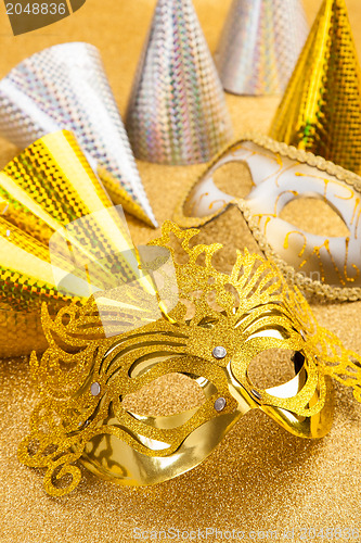 Image of Party motive with carnival mask and party hat