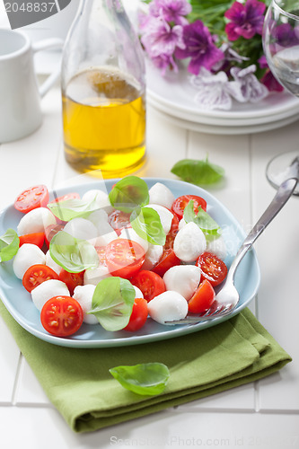 Image of Tomato salad with mozzarella and basil