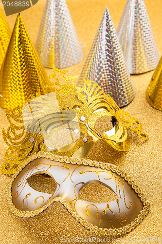 Image of Party motive with carnival mask and party hat