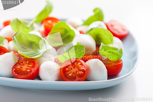 Image of Tomato salad with mozzarella and basil