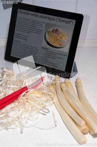 Image of Modern Cooking with Digital Tablet PC