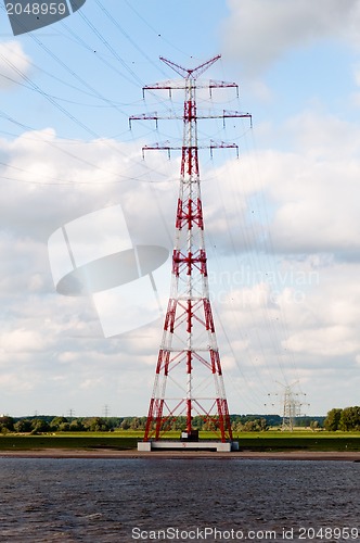 Image of Huge Power Pole on blue sky background