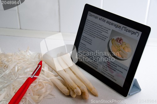 Image of Modern Cooking with Digital Tablet PC