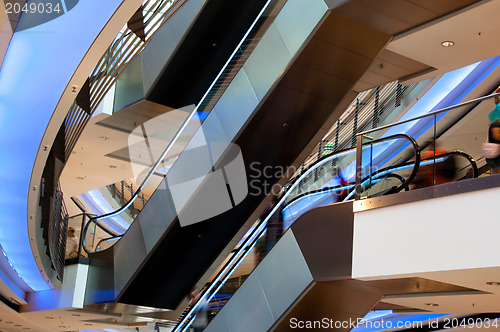 Image of People On Escalator In Modern Shopping Mall