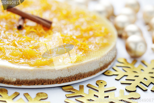 Image of cheesecake with oranges