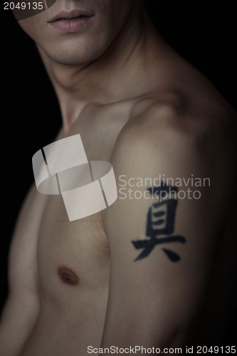 Image of Man with tattoo