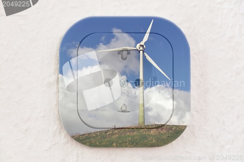 Image of Conceptual: Wind Turbine over Power Outlet