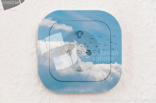 Image of Conceptual: Birds in the Sky over Power Outlet