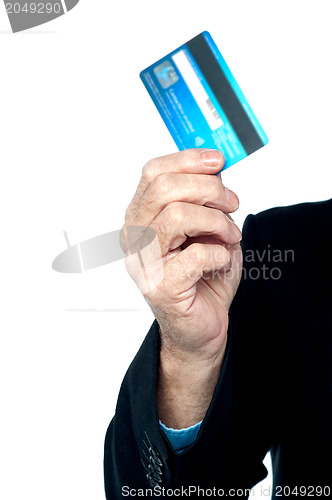 Image of Cropped image of a man showing credit card