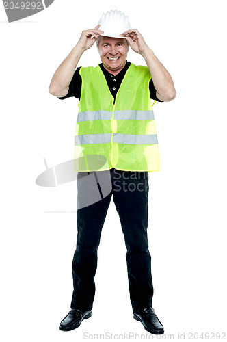 Image of Construction worker in fluorescent jacket