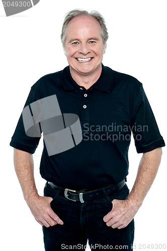 Image of Profile shot of a casual smiling retiree