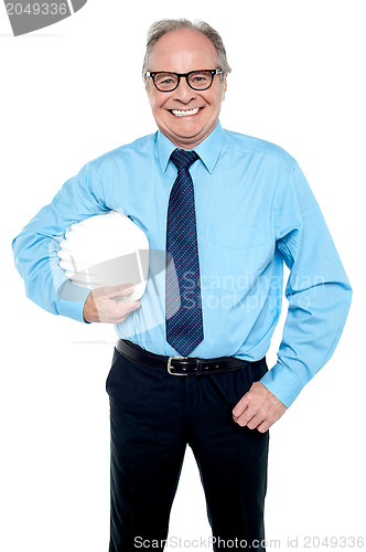 Image of Portrait of an architect holding a safety helmet