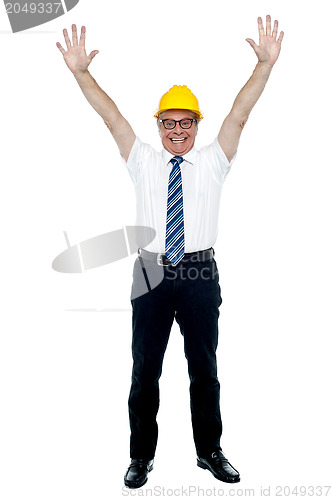 Image of Contemporary construction engineer celebrating his success