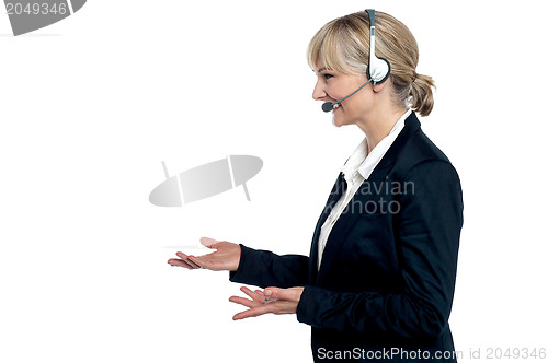 Image of Female customer care agent in a conversation