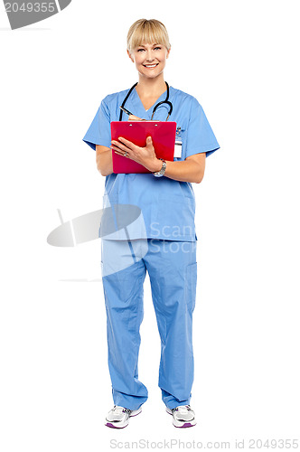 Image of Medical practitioner posing with a clipboard