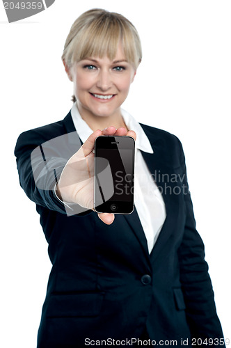 Image of Sales executive displaying brand new multimedia phone