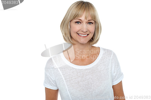 Image of Casual portrait of smiling middle aged woman