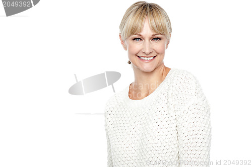 Image of Smiling middle aged woman in trendy wear