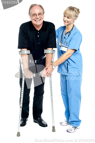 Image of Experienced physician assisting her patient in recovery process