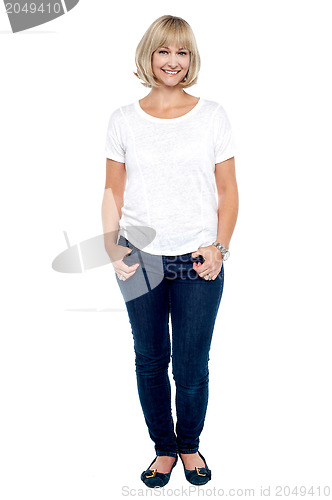 Image of Full length portrait of trendy middle aged woman