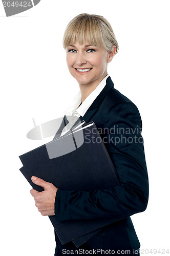 Image of Pretty business woman ready to attend meeting