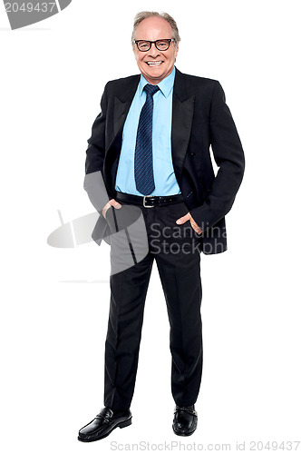 Image of Happy entrepreneur striking a confident pose