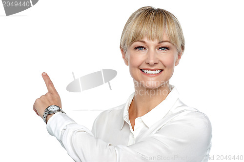 Image of Corporate lady pointing backwards