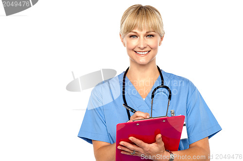 Image of Shot of a cheerful doctor doing her rounds