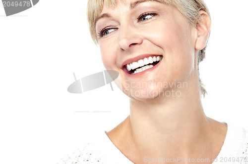 Image of Closeup shot of a beautiful woman smiling heartily