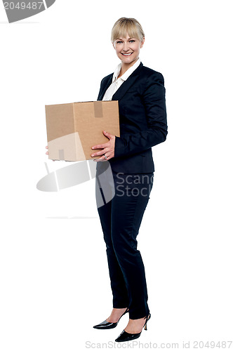 Image of Female business executive relocating her office