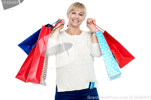 Image of Portrait of a middle aged shopaholic woman