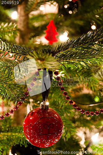 Image of Christmas Balls Hanging From Christmas Tree