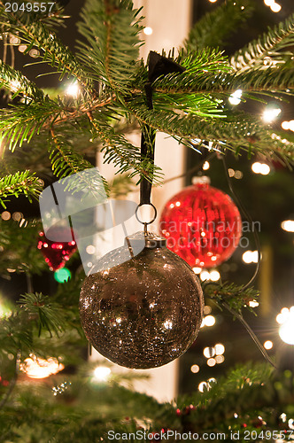 Image of Christmas Balls Hanging From Christmas Tree