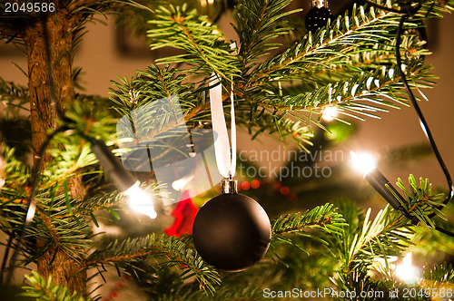 Image of Christmas Ball Hanging From Christmas Tree