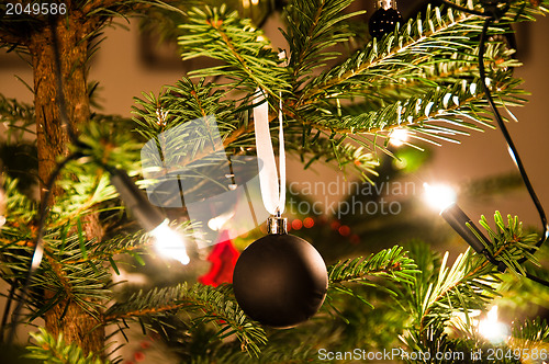 Image of Christmas Ball Hanging From Christmas Tree