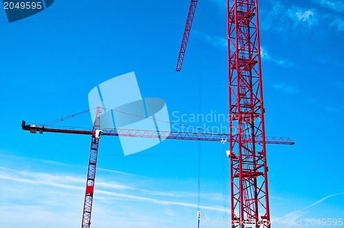 Image of Red tower construction cranes