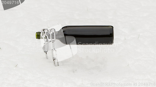 Image of Bottle of red wine and wineglasses isolated