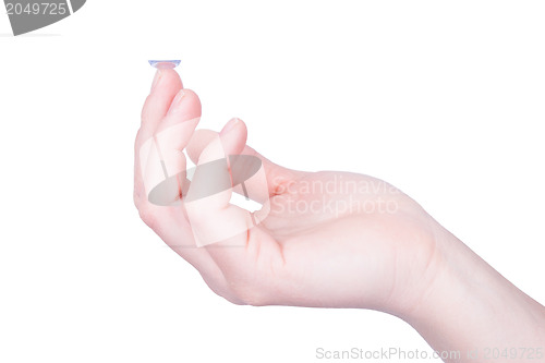 Image of Woman holds a Contact Lens