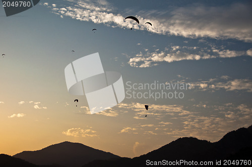 Image of Paragliders in sunset in Turkey