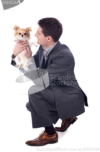 Image of business man and chihuahua