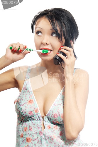 Image of Phone call and toothbrushing