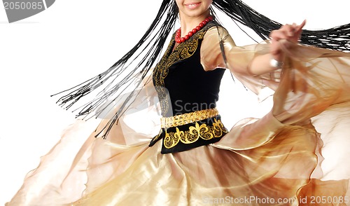 Image of Smiling dancer in motion with long hair