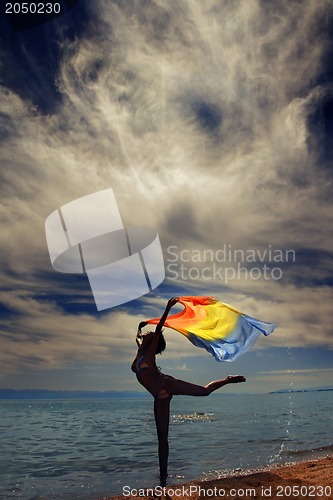 Image of Dancer at the sea during sunset